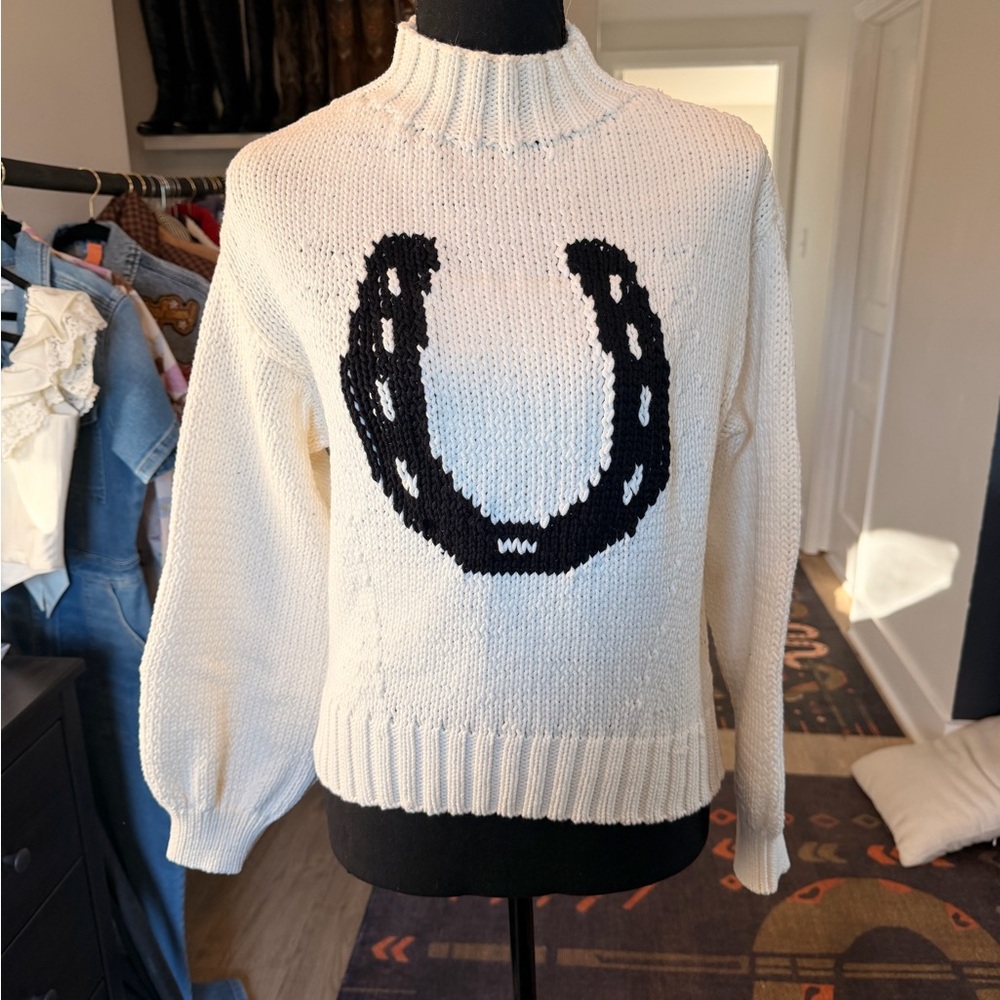 Maeve Cream Turtleneck Sweater with Black Design